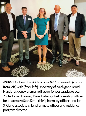 ASHP Chief Executive Officer Paul W. Abramowitz (second from left) with (from left) University of Michigan's Jerod Nagel, residency program director for postgraduate year 2 infectious diseases; Dana Habers, chief operating officer for pharmacy; Stan Kent, chief pharmacy officer; and John S. Clark, associate chief pharmacy officer and residency program director.
