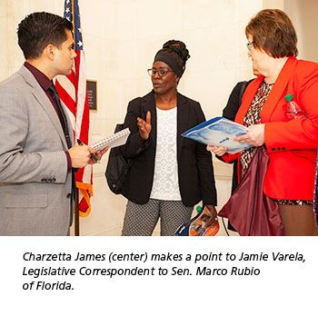 Charzetta James (right) makes a point to Jamie Varela,  Legislative Correspondent to Sen. Marco Rubio  of Florida.