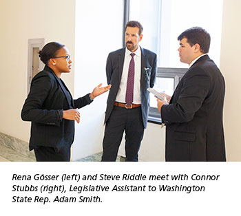 Rena Gösser (left) and Steve Riddle meet with Connor  Stubbs (right), Legislative Assistant to Washington  State Rep. Adam Smith.