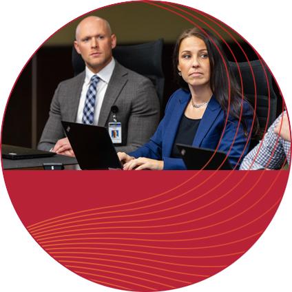 Managers Boot Camp - leaders in a meeting
